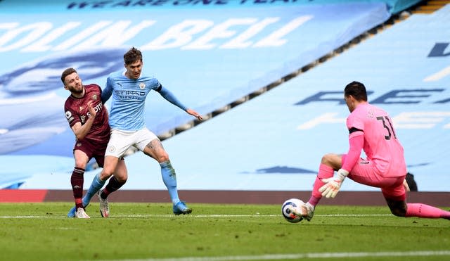 Stuart Dallas, left, snatched victory for Leeds at the Etihad Stadium with a late breakaway goal