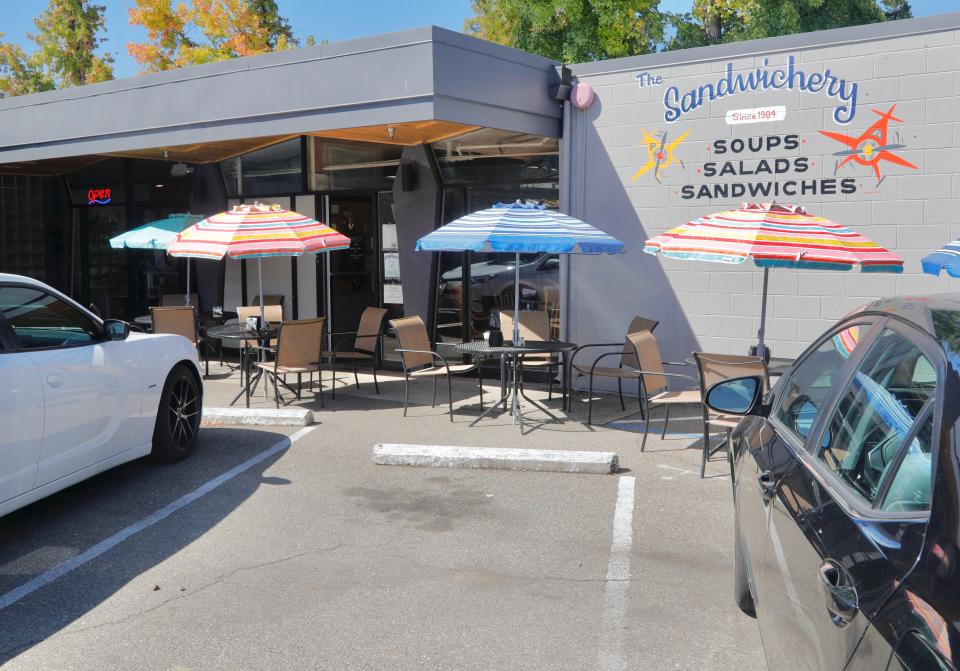 A scarce parking spot sits open in front of the Sandwichery on Thursday, Sept. 22, 2022, in downtown Redding. The Sandwichery's parking lot was nearly full that afternoon although the sandwich shop didn't have any customers at the time.