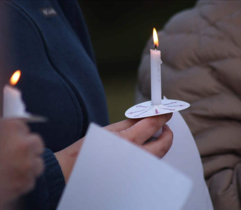 Community members came out Thursday night to participate in a candlelight gathering and prayer group in support of Quincy students impacted by strange neurological symptoms. (WLNS)
