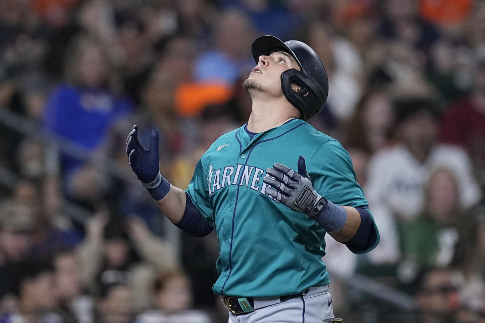 Seattle Mariners' Luis Urías celebrates after hitting a solo home run during the fifth inning of a baseball game against the Houston Astros Saturday, May 4, 2024, in Houston. (AP Photo/Kevin M. Cox)