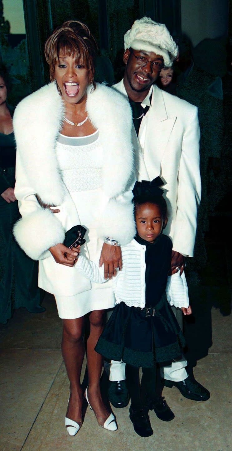 Whitney with Bobby Brown and their daughter Bobbi Kristina in 1998 (WENN)