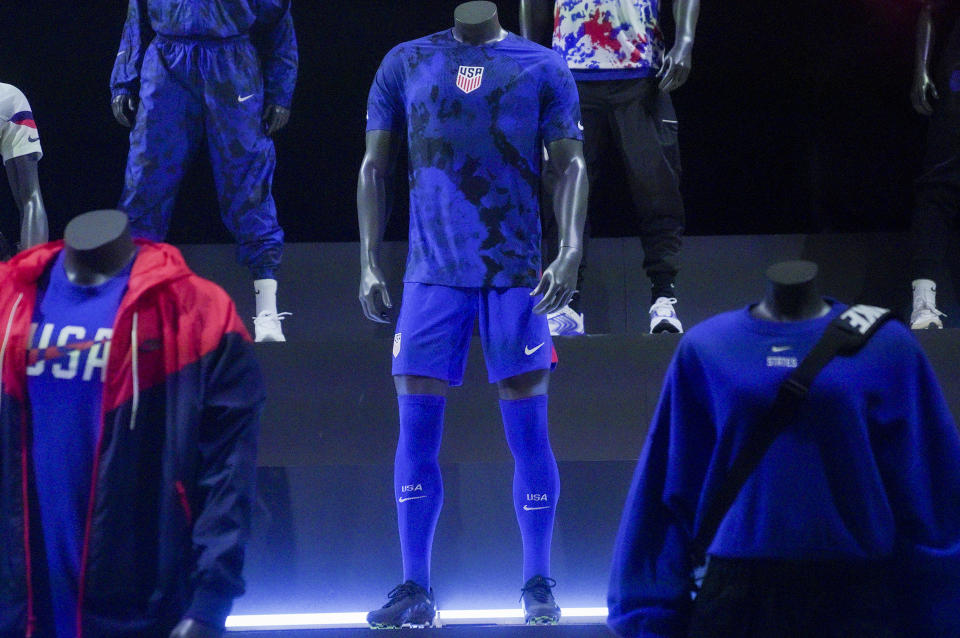 A new uniform, center, for the U.S. men's World Cup soccer team is displayed by Nike, Wednesday, Aug. 31, 2022, in New York. (AP Photo/Bebeto Matthews)