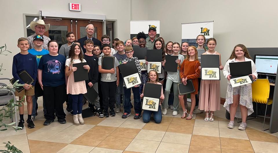 Panther Pride Awards: Tony Mchale with cowboy hat (left), Tony Way is in the middle with the suit (middle), and Randy Hurst is in the green shirt (right)