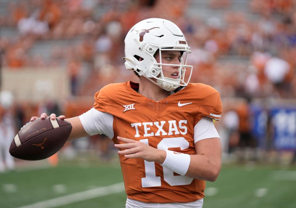 Texas Longhorns quarterback Arch Manning warms up before the game against the BYU Cougars at Royal-Memorial Stadium on Saturday October 28, 2023.