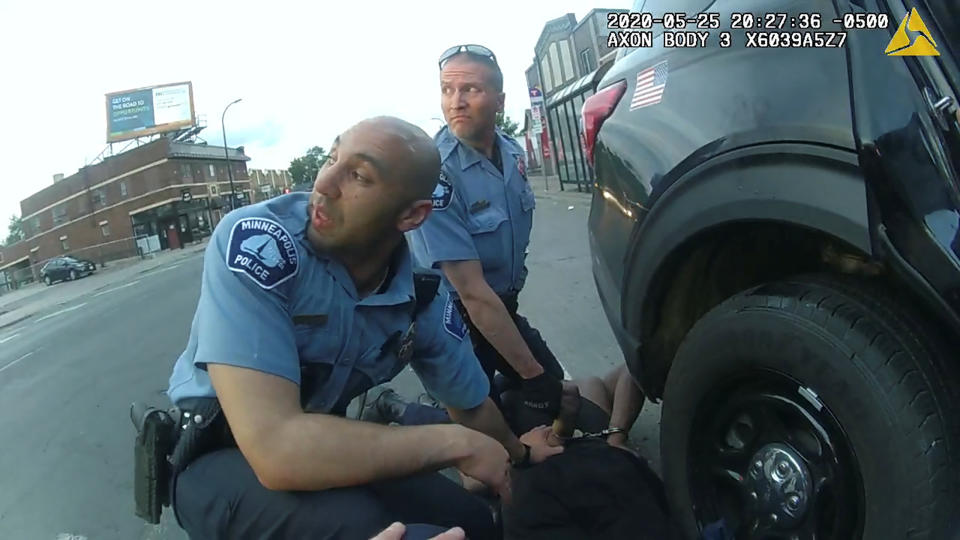 SENSITIVE MATERIAL. THIS IMAGE MAY OFFEND OR DISTURB. George Floyd is kneeled upon by former Minneapolis Police Department (MPD) officer Derek Chauvin next to former MPD officer  J. Alexander Kueng, as seen in a still from the body camera video of former MPD officer Thomas Lane, during the police custody in which he died in Minneapolis, Minnesota, U.S. May 25, 2020. Video taken May 25, 2020.  MPD/Hennepin County District Court/Handout via REUTERS THIS IMAGE HAS BEEN SUPPLIED BY A THIRD PARTY.