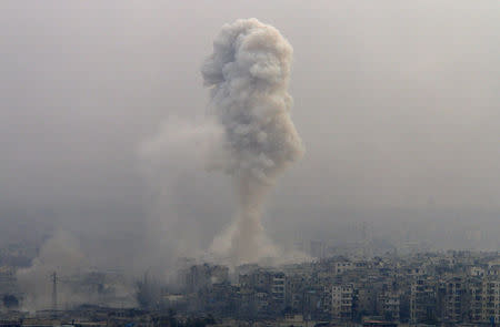 Smoke rises after air strikes on rebel-controlled besieged eastern Aleppo, Syria December 5, 2016. REUTERS/Omar Sanadiki