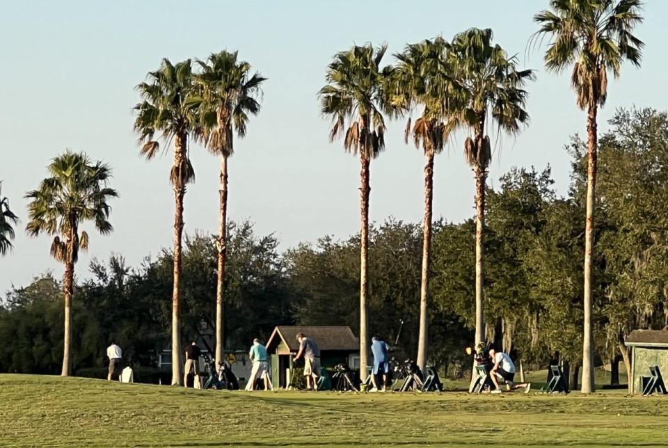 Golfers hit balls on the driving range at the LPGA International golf community in Daytona Beach on Friday, Dec. 9, 2022. A developer plans to build a project called LPGA Golf Villas that would add 154 homes and 40 townhouses in the area surrounding the driving range.