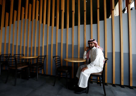 Nayef al-Hayzan, 28, poses for a photograph at a cafe in Riyadh, Saudi Arabia, May 15, 2017. REUTERS/Faisal Al Nasser