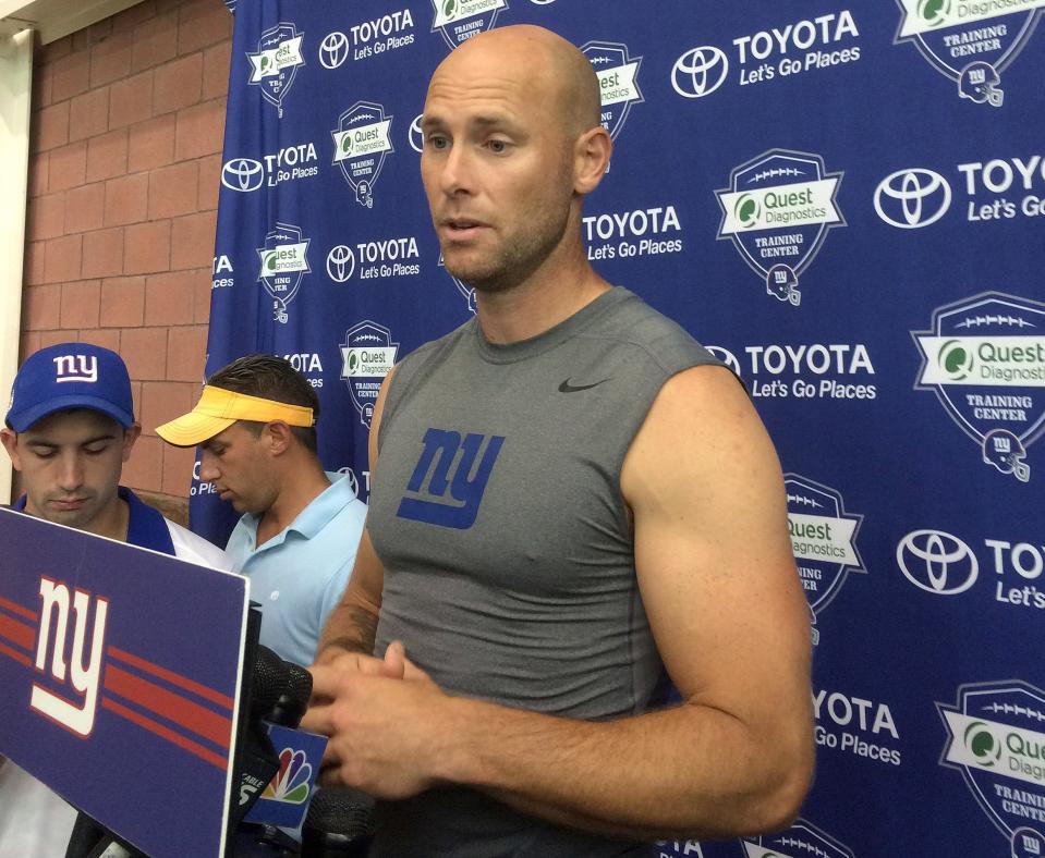 New York Giants kicker Josh Brown speaks with reporters at NFL football training camp on Thursday, Aug. 18, 2016, in East Rutherford, N.J. Brown has confirmed that an arrest on a domestic violence charge in May 2015 led to his one-game suspension by the NFL for violating the league's personal conduct policy.