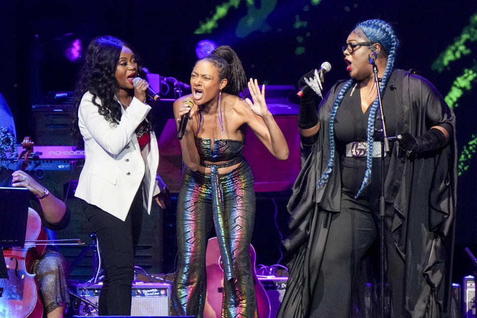 Ruby Amanfu, from left, Allison Russell and Shea Diamond perform at "Love Rising," a benefit concert for the Tennessee Equality Project, Inclusion Tennessee, OUTMemphis and The Tennessee Pride Chamber, on Monday, March 20, 2023, at the Bridgestone Arena in Nashville, Tenn. (Photo by Ed Rode/Invision/AP)