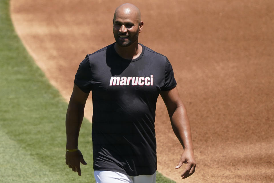 Los Angeles Angels first baseman Albert Pujols smiles during baseball practice at Angels Stadium, Monday, July 6, 2020, in Anaheim, Calif. (AP Photo/Ashley Landis)