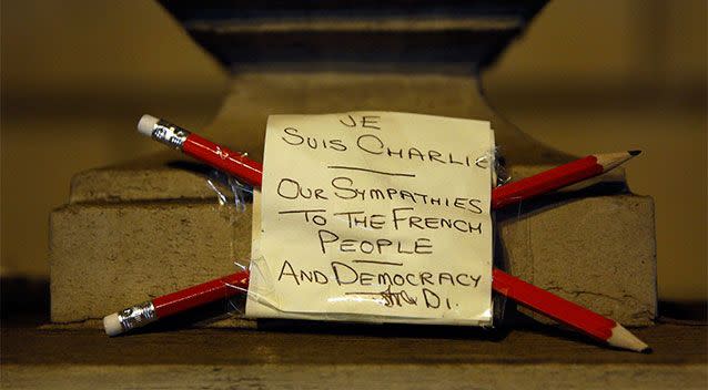 Two pencils left with a note to pay tribute to the victims of a shooting by gunmen at the offices of weekly newspaper Charlie Hebdo in Paris, are seen outside the French embassy in London. Photo: REUTERS