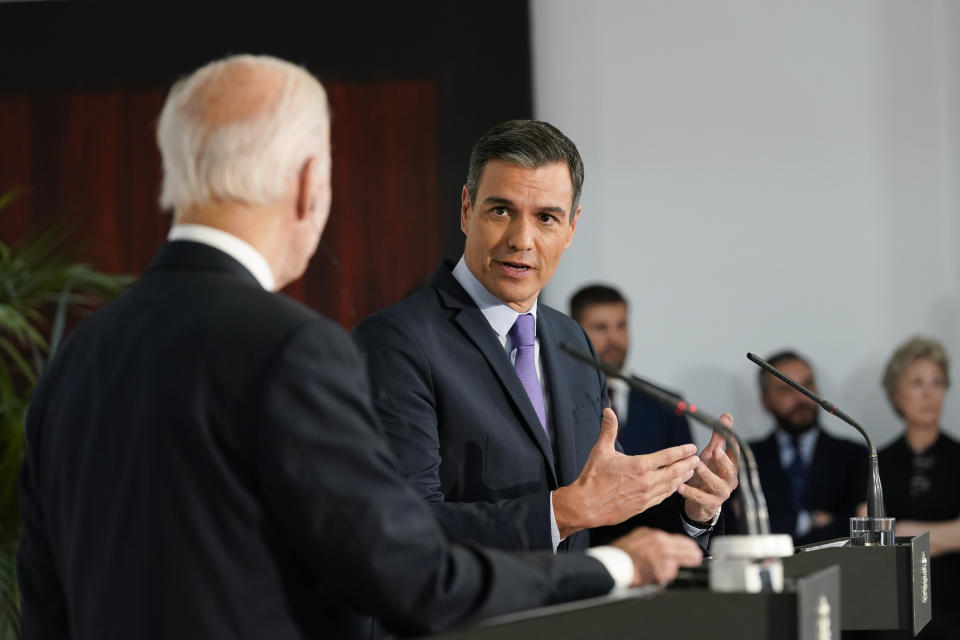 President Joe Biden listens as Spain's Prime Minister Pedro Sanchez speaks at the Palace of Moncloa in Madrid, Tuesday, June 28, 2022. Biden will also be attending the North Atlantic Treaty Organization summit in Madrid. (AP Photo/Susan Walsh)