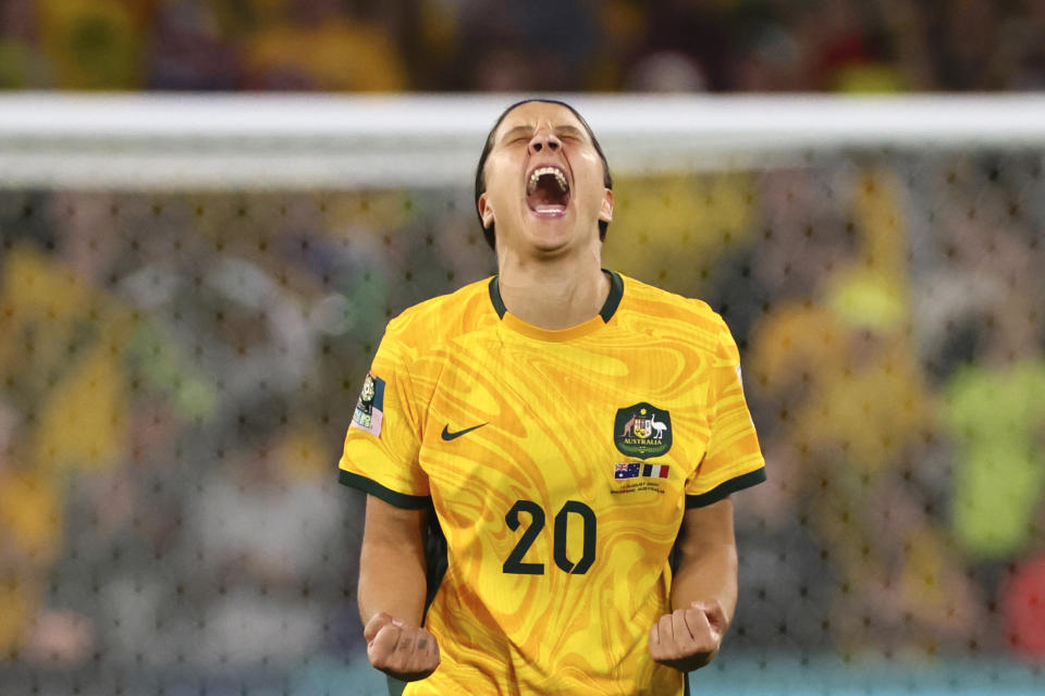 Australia's Sam Kerr celebrates after scoring during a penalty shootout during the Women's World Cup quarterfinal soccer match between Australia and France in Brisbane, Australia, Saturday, Aug. 12, 2023. (AP Photo/Tertius Pickard)