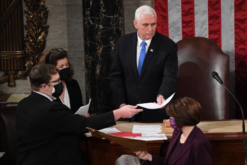 Vice President Mike Pence presides over a joint session of Congress on Jan. 6 to certify electoral votes in the 2020 election, a day when the proceedings were disrupted when rioting supporters of President Trump broke into the Capitol.