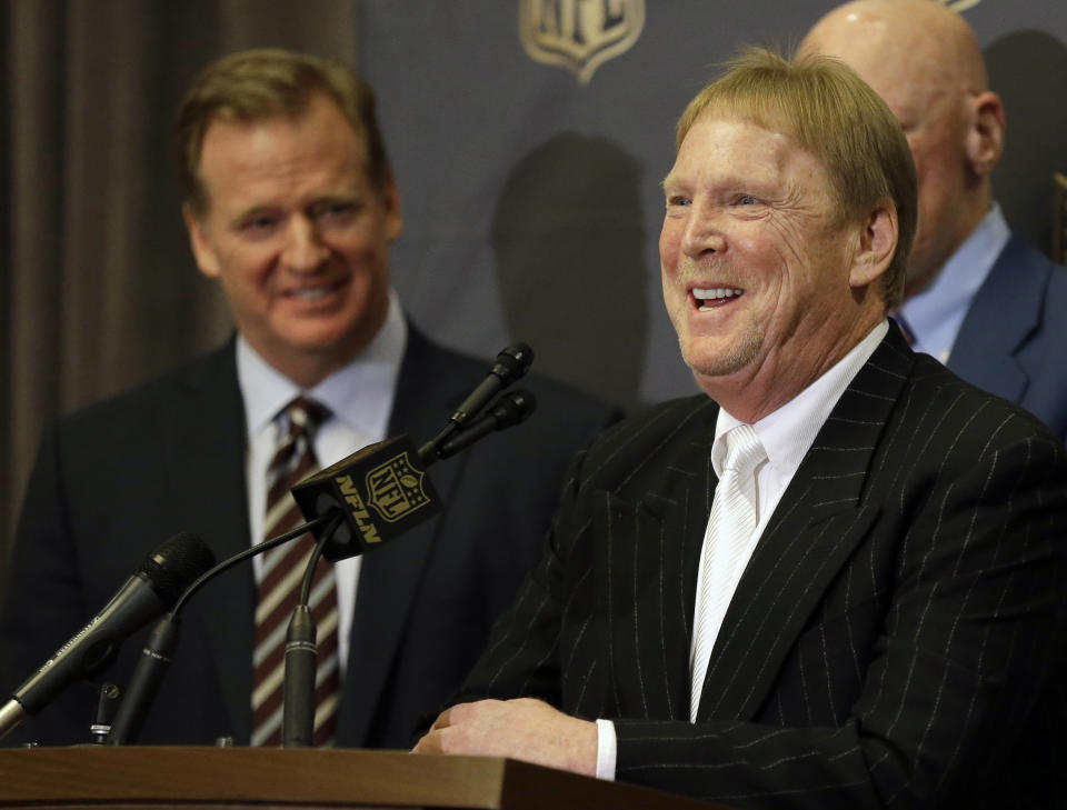 FILE - In this Jan. 12, 2016, file photo, NFL Commissioner Roger Goodell, left, laughs as Oakland Raiders owner Mark Davis talks to the media after an NFL owners meeting in Houston. The Raiders have filed paperwork to move to Las Vegas. Clark County Commission Chairman Steve Sisolak told The Associated Press on Thursday, Jan. 19, 2017, that he spoke with the Raiders. (AP Photo/Pat Sullivan, File)
