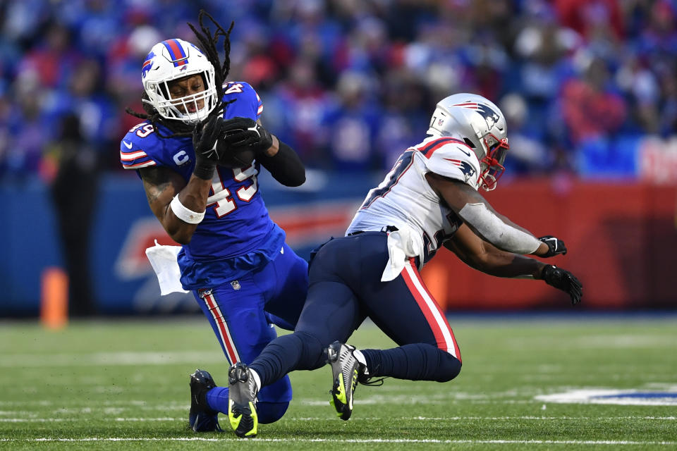 FILE - Buffalo Bills linebacker Tremaine Edmunds (49) makes an interception on a pass to New England Patriots running back Damien Harris (37) during the second half of an NFL football game, Sunday, Jan. 8, 2023, in Orchard Park. The Chicago Bears made two big additions at linebacker, agreeing to contracts with Buffalo Bills two-time Pro Bowler Edmunds and former Philadelphia Eagle T.J. Edwards, two people familiar with the situations said Monday, March 13, 2023. (AP Photo/Adrian Kraus, File)