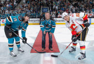 Owen Nolan takes part in a ceremonial faceoff in San Jose on Wednesday.