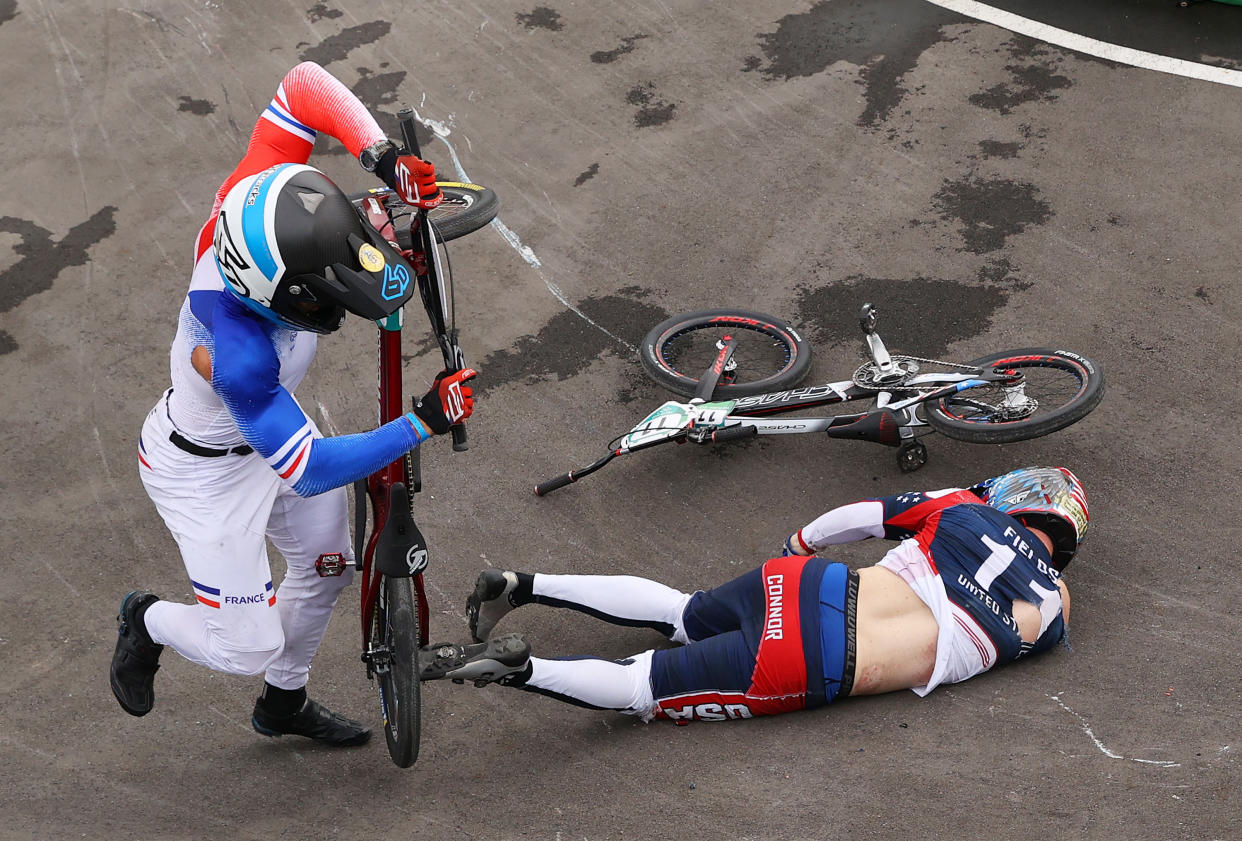 TOKYO, JAPAN - JULY 30: Romain Mahieu of Team France and Connor Fields of Team United States crash during the Men's BMX semifinal heat 1, run 3 on day seven of the Tokyo 2020 Olympic Games at Ariake Urban Sports Park on July 30, 2021 in Tokyo, Japan. (Photo by Francois Nel/Getty Images)