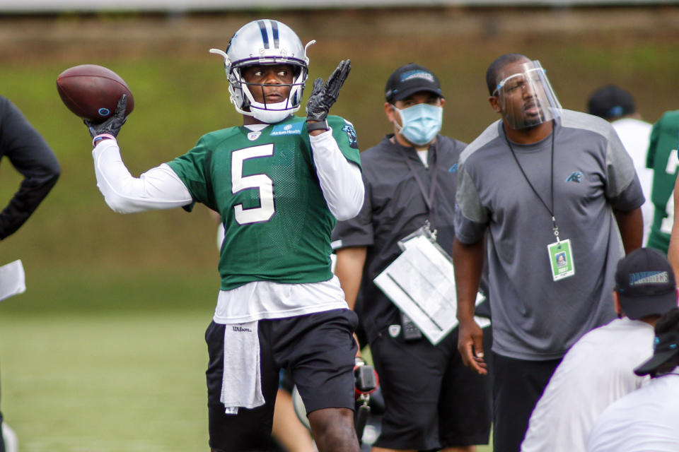 FILE - In this Sunday, Aug. 16, 2020, file photo, Carolina Panthers quarterback Teddy Bridgewater (5) throws a pass during NFL football training camp in Charlotte, N.C. With stalwarts like Cam Newton, Greg Olsen, Luke Kuechly and Trai Turner all leaving Carolina, the Panthers are the only team with less than half of snaps last season returning, At least new quarterback Teddy Bridgewater has some familiarity with offensive coordinator Joe Brady’s system, having spent the 2018 season together in New Orleans. (AP Photo/Nell Redmond, File)