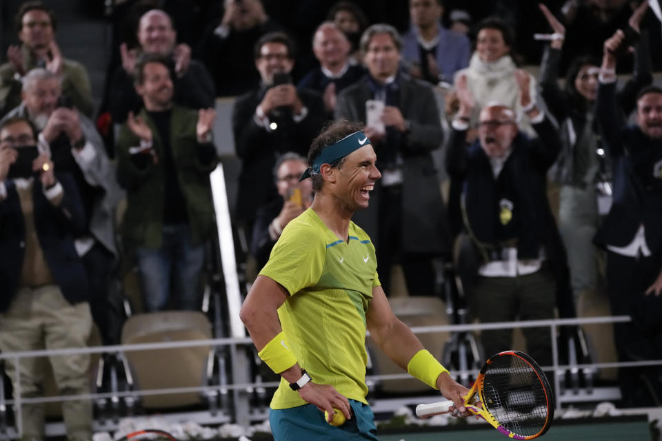 Spain's Rafael Nadal celebrates winning his quarterfinal match against Serbia's Novak Djokovic in four sets, 6-2, 4-6, 6-2, 7-6 (7-4), at the French Open tennis tournament in Roland Garros stadium in Paris, France, Wednesday, June 1, 2022. (AP Photo/Christophe Ena)