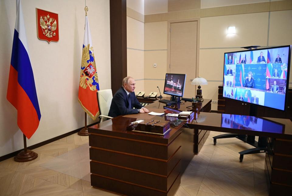 <span class="caption">Russian President Vladimir Putin remotely leads a U.N. Security Council meeting on March 3, 2022.</span> <span class="attribution"><a class="link " href="https://media.gettyimages.com/photos/russian-president-vladimir-putin-chairs-a-meeting-with-members-of-the-picture-id1238903186?s=2048x2048" rel="nofollow noopener" target="_blank" data-ylk="slk:Andrey Gorshkov/Sputnik/AFP via Getty Images;elm:context_link;itc:0;sec:content-canvas">Andrey Gorshkov/Sputnik/AFP via Getty Images</a></span>