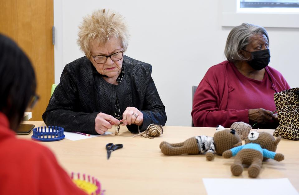 Roberta Covington and Clara Martin of Canton work on their skills during the Knitting and Crochet Club gathering at the Stark Library's DeHoff Memorial Branch in Canton.