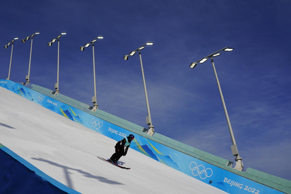 Mathilde Gremaud, of Switzerland, trains ahead of the women's freestyle skiing Big Air qualification round of the 2022 Winter Olympics, Monday, Feb. 7, 2022, in Beijing. (AP Photo/Matt Slocum)