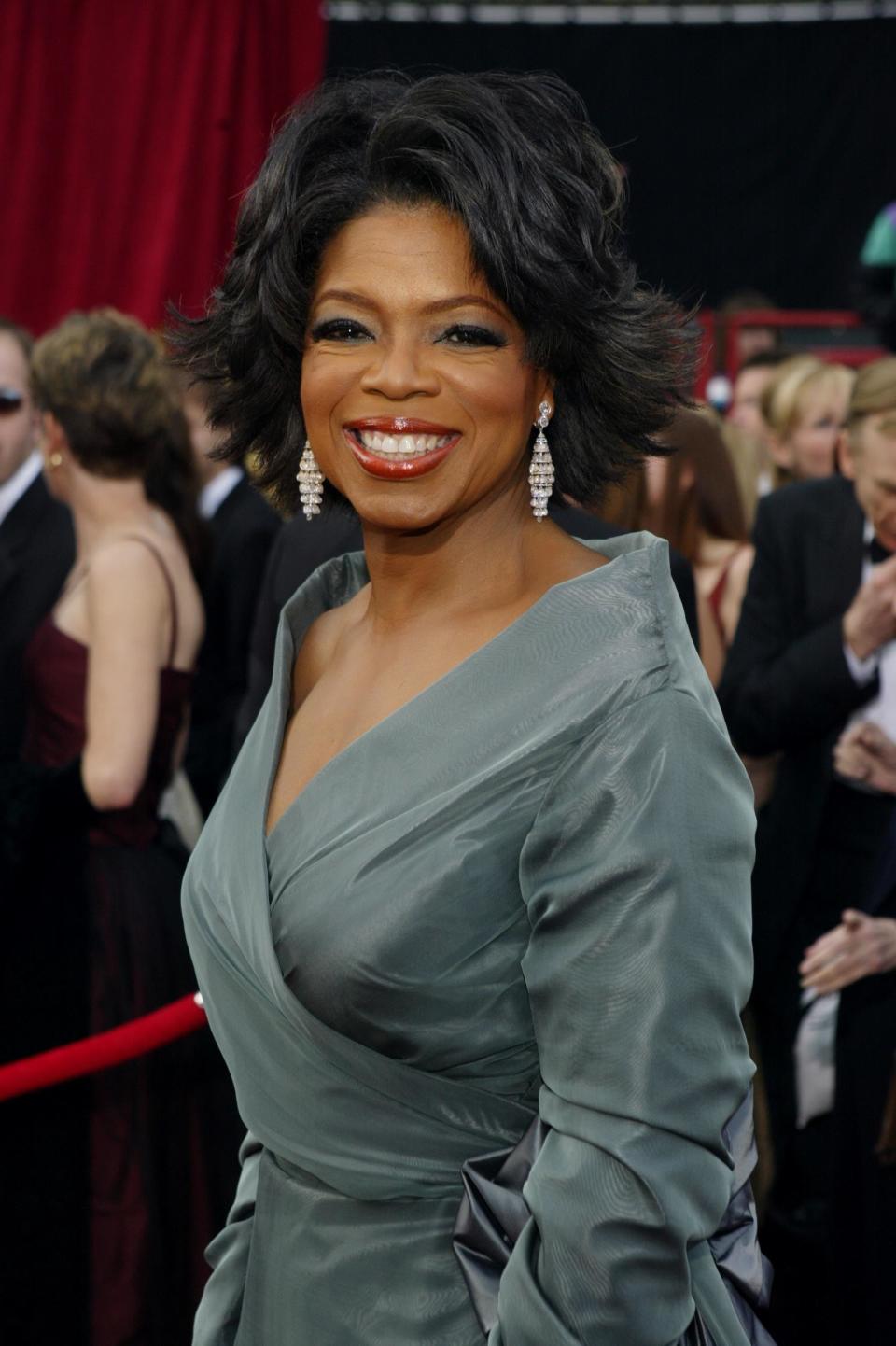 Oprah Winfrey smiles at the 76th Annual Academy Awards in 2004