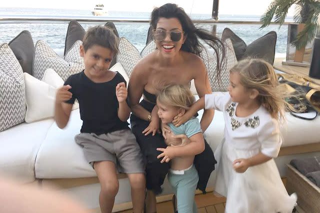 <p>KOURTNEY KARDASHIAN/INSTAGRAM</p> Kourtney Kardashian with her three older kids