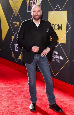 <p>Matt Baron/BEI/Shutterstock</p> John Travolta on April 18, 2024 in Hollywood, California.