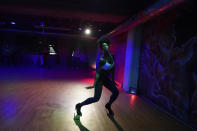Kafi Payne dances during a freestyle dance class at Rhythma Studios on Tuesday, Oct. 5, 2021, in Atlanta. (AP Photo/Brynn Anderson)