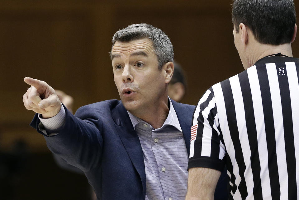 Virginia coach Tony Bennett reacts during the first half of the team's NCAA college basketball game against Duke in Durham, N.C., Saturday, Jan. 19, 2019. (AP Photo/Gerry Broome)