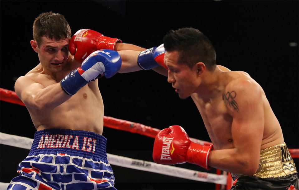 Rod Salka (L) wore trunks with bricks and “America 1st” written on them against Mexico’s Francisco Vargas. (Courtesy Golden Boy Promotions)