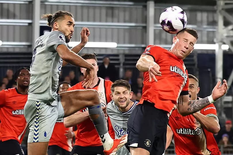 Luton Town's English midfielder #06 Ross Barkley (R) wins a header during the English Premier League football match between Luton Town and Everton at Kenilworth Road in Luton, north of London on May 3, 2024. (Photo by HENRY NICHOLLS / AFP) / RESTRICTED TO EDITORIAL USE. No use with unauthorized audio, video, data, fixture lists, club/league logos or 'live' services. Online in-match use limited to 120 images. An additional 40 images may be used in extra time. No video emulation. Social media in-match use limited to 120 images. An additional 40 images may be used in extra time. No use in betting publications, games or single club/league/player publications. /  (Photo by HENRY NICHOLLS/AFP via Getty Images)