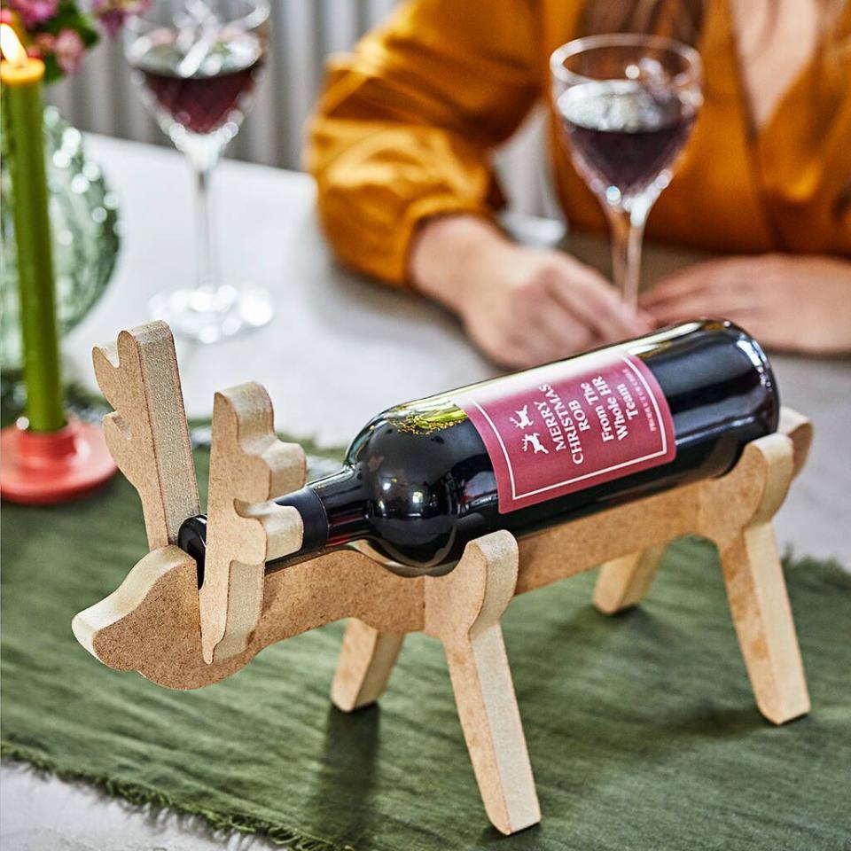 <p>Complete Christmassy vibes over here with this reindeer wine holder.</p><p><a class="link " href="https://go.redirectingat.com?id=127X1599956&url=https%3A%2F%2Fwww.notonthehighstreet.com%2Fintervino%2Fproduct%2Freindeer-wine-holder-and-personalised-wine&sref=https%3A%2F%2Fwww.delish.com%2Fuk%2Fcocktails-drinks%2Fg29855274%2Falcoholic-gift-guide%2F" rel="nofollow noopener" target="_blank" data-ylk="slk:BUY NOW;elm:context_link;itc:0;sec:content-canvas">BUY NOW</a> <strong>£35.00, Not On The High Street</strong></p>