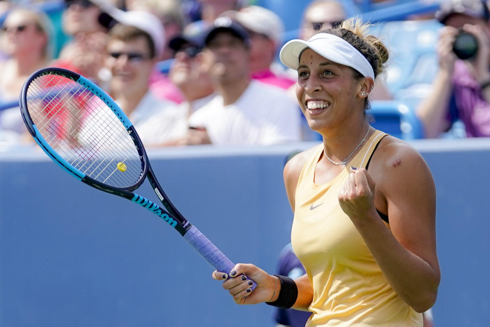 Madison Keys, of the United States, celebrates after defeating Svetlana Kuznetsova, of Russia, in the women's final match during the Western & Southern Open tennis tournament Sunday, Aug. 18, 2019, in Mason, Ohio. (AP Photo/John Minchillo)