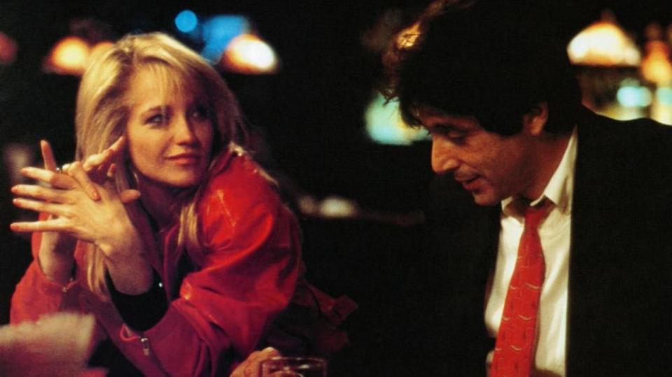 Ellen Barkin sitting next to Al Pacino