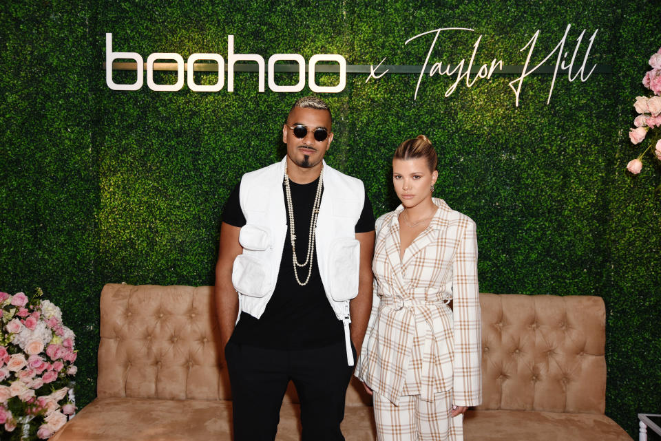 MALIBU, CALIFORNIA - OCTOBER 13: (L-R) Umar Kamani and Sofia Richie attend boohoo x Taylor Hill Tea Party at The Beverly Hills Hotel on October 13, 2019 in Beverly Hills, California. (Photo by Presley Ann/Getty Images for boohoo.com)