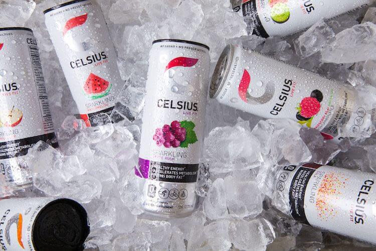 Several cans of Celsius on ice.