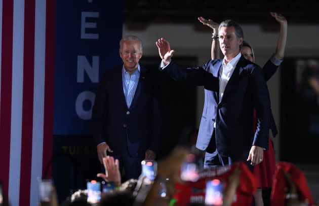 President Joe Biden waves onstage with California Gov. Gavin Newsom and his wife, Jennifer Siebel Newsom, during a campaign event on Sept. 13, 2021 in Long Beach, California. (Photo: Wally Skalij via Getty Images)