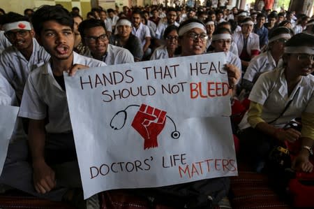 Medical students participate in a protest called by Indian Medical Association (IMA), during a nationwide doctors strike in Ahmedabad