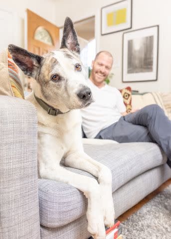 <p>Courtesy of Nadav Schlesinger</p> Josh the dog and his pet parent, Nadav