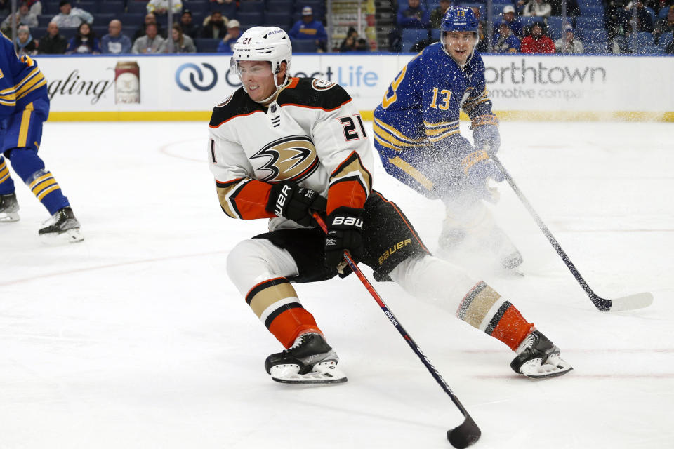 Anaheim Ducks center Isac Lundestrom (21) controls the puck during the second period of an NHL hockey game against the Buffalo Sabres, Tuesday, Dec. 7, 2021, in Buffalo, N.Y. (AP Photo/Jeffrey T. Barnes)
