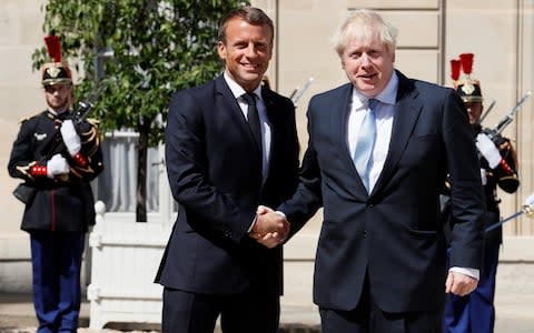 Boris Johnson and Emmanuel Macron - Credit: GONZALO FUENTES/REUTERS
