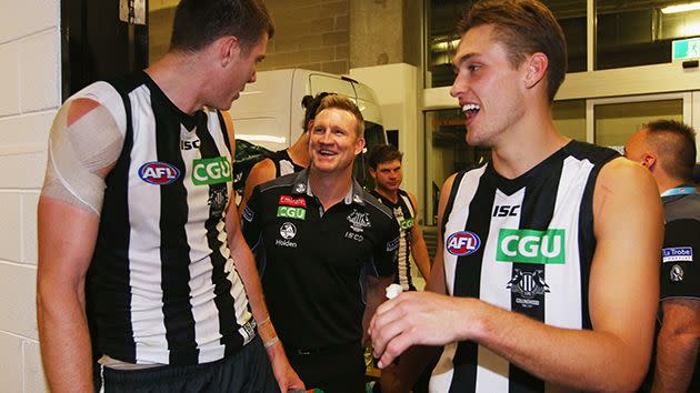 Coach Nathan Buckley jokes with Cox after the match. Image: Getty