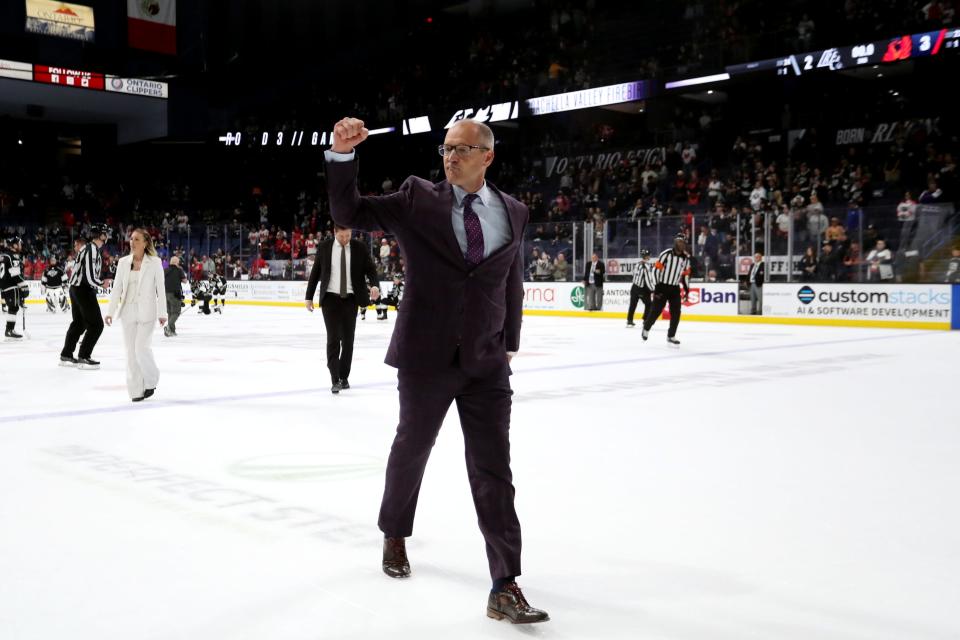 Coachella Valley Firebirds head coach Dan Bylsma gestures to the fans after a 3-2 win to sweep the Ontario Reign in the Pacific Division Finals at the Toyota Arena in Ontario, Calif., on Sunday, May 19, 2024.