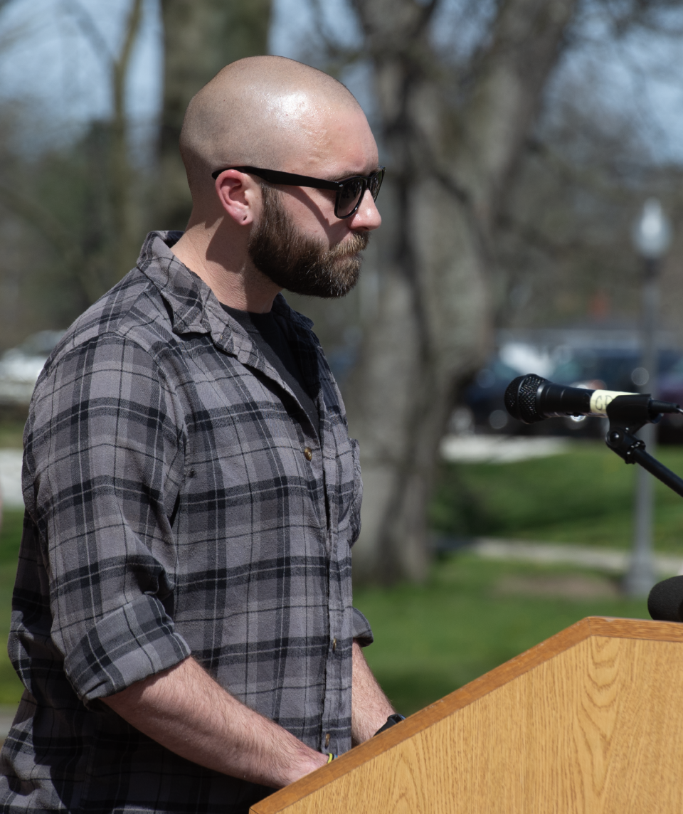Paul Prediger, who was shot by Kyle Rittenhouse in 2020, speaks to the crowd at Oscar Ritchie Hall during an event Tuesday to oppose Rittenhouse's appearance at Kent State University.