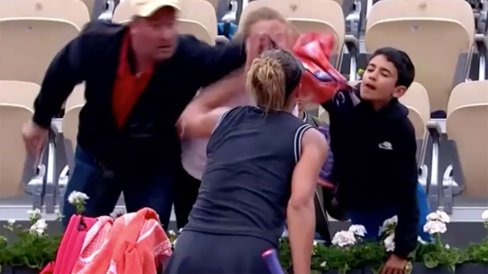 The man reached over and snatched the towel. Image: Eurosport