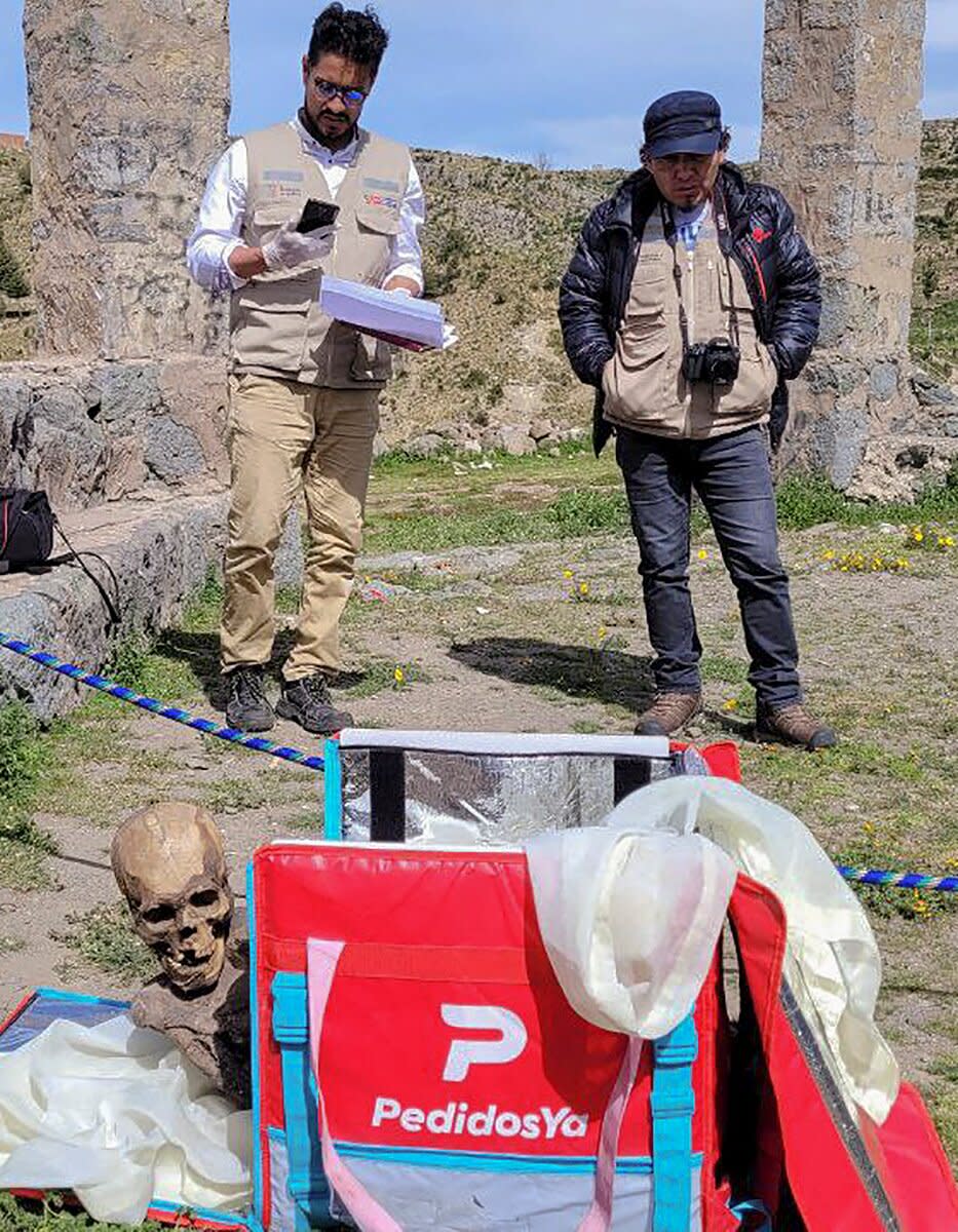mummy inside a cooler box used by a delivery service worker in Puno, Peru
